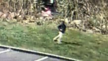 Surveillance video shows a person who is believed to have tried to kidnap a woman in Burlington, Massachusetts, on Sunday, May 8, 2022.