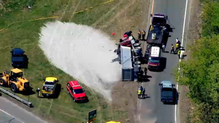 A dump truck crashed on an I-95 exit ramp in Waltham, Massachusetts, on Monday, May 16, 2022.