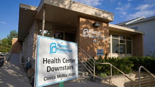 A sign is shown in front of Planned Parenthood of Utah Tuesday, June 28, 2022, in Salt Lake City. A Utah judge on Monday, June 27, temporarily blocked that state's near-total abortion ban, after Planned Parenthood challenged a trigger law there that contains narrow exceptions.