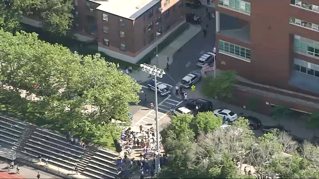 Police at Charlestown High School in Boston on Monday, June 13, 2022, investigating reports of gunfire.