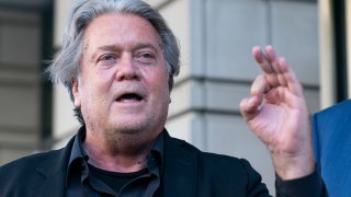 Former White House strategist Steve Bannon speaks with reporters as he departs federal court on Wednesday, July 20, 2022, in Washington.