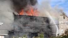 A fire burns at Nantucket's Veranda House hotel on Saturday, July 9, 2022.