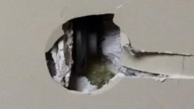 A photo provided to the NBC10 Investigators of the hole in the wall.