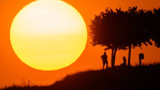 People photographed in Lower Saxony, Germany, on July 19, 2022. A number of European countries were affected by a heatwave last month.