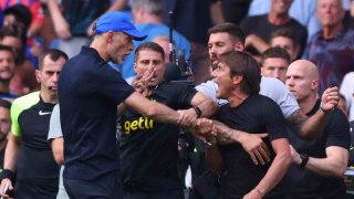 Chelsea head coach Thomas Tuchel, left, and Tottenham Hotspur head coach Antonio Conte, right, clash after the Premier League match between Chelsea FC and Tottenham Hotspur at Stamford Bridge on August 14, 2022 in London, United Kingdom.