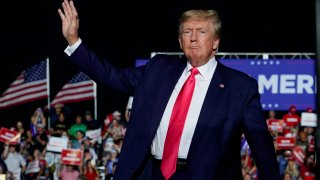 FILE - Former President Donald Trump arrives at a rally, Aug. 5, 2022