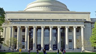 CAMBRIDGE, MA – OCTOBER 10: Massachusetts Institute of Technology students play football outside the Maclaurin building October 10, 2003 in Cambridge, Massachusetts. (Photo by William B. Plowman/Getty Images)