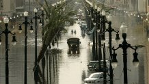 A military truck drives down a flooded Canal St., Aug. 31, 2005, in New Orleans, Louisiana. Hundreds are feared dead and thousands were left homeless in Louisiana, Mississippi, Alabama and Florida by Hurricane Katrina.