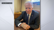 President Joe Biden wearing a "Mighty Quinn" bracelet on Air Force One while flying from Boston to Washington, D.C., on Monday, Sept. 12, 2022.