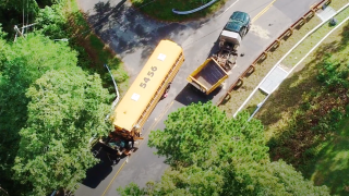 A school bus and dump truck that crashed in Barnstable, Massachusetts, on Monday, Sept. 26, 2022.