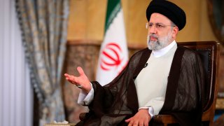 In this photo released by the official website of the office of the Iranian Presidency, President Ebrahim Raisi speaks in an interview with the state TV at the presidency office in Tehran, Iran, Wednesday, Sept. 28, 2022.