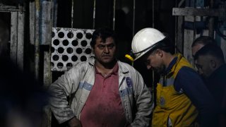 Miners and rescue members wait in front of the mine in Amasra, in the Black Sea