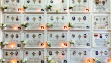 FILE - Candles are lit on a memorial wall during an anniversary memorial service at the Holy Trinity Cathedral in Addis Ababa, Ethiopia, March 8, 2020, to remember those who died when Ethiopian Airlines flight ET302, a Boeing 737 Max, crashed shortly after takeoff on March 10, 2019, killing all 157 on board. A federal judge ruled Friday, Oct. 21, 2022, that relatives of people who were killed in the crashes of two Boeing 737 Max planes are crime victims under federal law, finding that the Justice Department should have notified families before privately negotiating a settlement that spared Boeing from criminal prosecution. (AP Photo/Mulugeta Ayene, File)