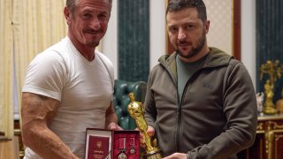 Ukrainian President Volodymyr Zelenskyy, right, poses with U.S. actor Sean Penn