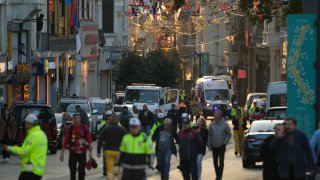 Security and ambulances at the scene after an explosion on Istanbul's popular pedestrian Istiklal Avenue
