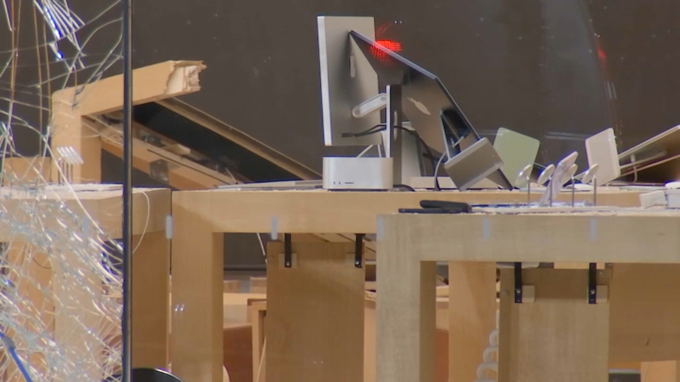 Driver charged in deadly Apple store crash said his foot got stuck