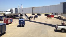 Prince William boarding a plane in Memphis in 2014 for a flight to Dallas in coach.