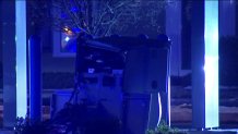 A damaged ATM after a burglary attempt in Concord, Massachusetts, on Thursday, Dec. 15, 2022.