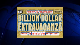 A sign for the Massachusetts Lottery's new Billion Dollar Extravaganza game, with a $50 scratch-off ticket