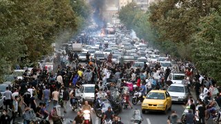 People protest in Iran's capital Tehran on Wednesday.