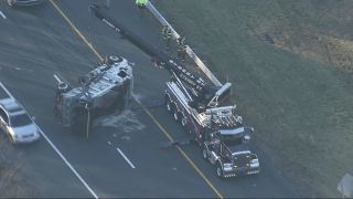 A crashed dump truck on Interstate 295 in Attleboro, Massachusetts, on Wednesday, Dec. 21, 2022.