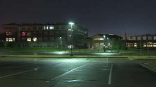 A nighttime photo of the Beverly High School building