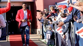 This Oct. 23, 2021, file photo shows Willie McGinest be introduced during the Patriots Hall of Fame Induction Ceremony at Gillette Stadium in Foxborough, Massachusetts.