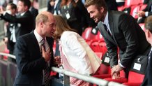 This June 29, 2021, file photo shows Prince William with David Beckham during the UEFA Euro 2020 Championship Round of 16 match between England and Germany at Wembley Stadium in London.