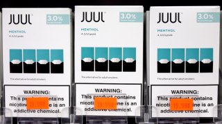 Packages of Juul e-cigarettes are displayed for sale in the Brazil Outlet shop on June 22, 2022 in Los Angeles, California.