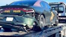 A New Hampshire State Police cruiser damaged in a crash on Saturday, Dec. 24, 2022, in Salem.