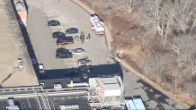 First responders at the scene of a deadly gas leak in Norwood, Massachusetts, on Tuesday, Dec. 20, 2022. The leak was reported on Monday and left one man dead and sent another to the hospital.