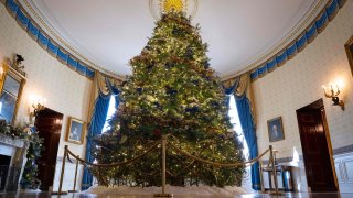 The official White House Christmas tree stands in the Blue room during a media preview for the 2022 Holidays at the White House in Washington, D.C., on Monday, Nov. 28, 2022.