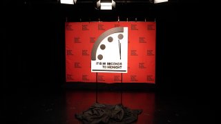 The Doomsday Clock stands in a broadcast studio before a virtual news conference at the National Press Club in Washington, Jan. 24, 2023.
