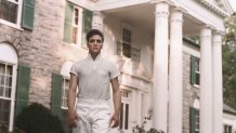 Rock and roll singer Elvis Presley strolls the grounds of his Graceland estate in circa 1957.