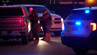 Las Vegas police work near the home of former actor Nathan Lee Chasing His Horse, who goes by Nathan Chasing Horse, Jan. 31, 2023, in North Las Vegas, Nev.