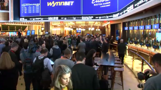 Crowds are pictured at Encore Boston Harbor as sports betting is officially legalized in Massachusetts