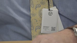 A Centegix CrisisAlert badge hangs from a lanyard at a Bangor, Maine, school