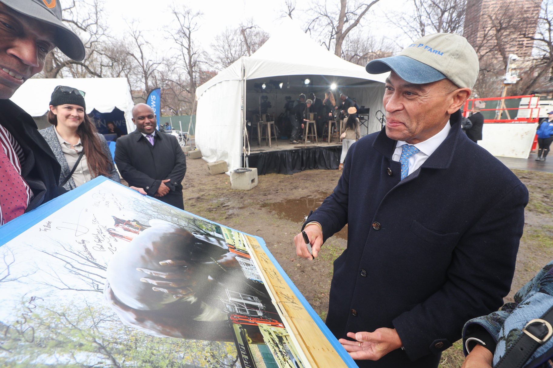 Former Massachusetts Gov. Deval Patrick is part of the unveiling ceremony of "The Embrace."