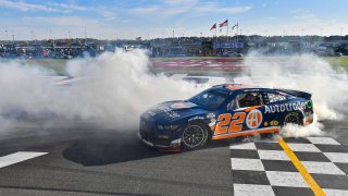 HAMPTON, GA – MARCH 19: Joey Logano does a burnout in the Autotrader Ford after winning the Ambetter Health 400 in the NASCAR Cup Series on Sunday, March 19, 2023 at the Atlanta Motor Speedway in Hampton, Ga.