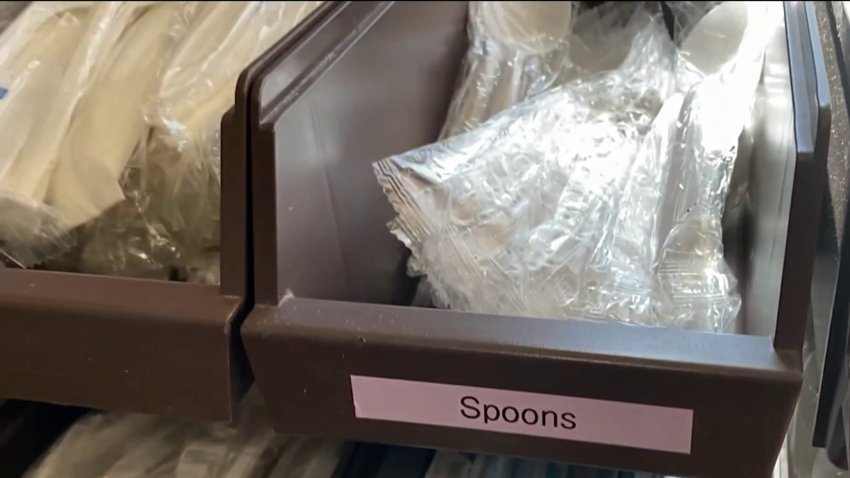 A display of plastic spoons at a restaurant