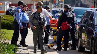 FILE - Pittsburgh Police and paramedics respond to Pittsburgh Central Catholic High School for what turned out to be a hoax report of an active shooter, on March 29, 2023, in the Oakland neighborhood of Pittsburgh.