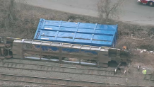 A derailed freight train in Ayer, Massachusetts, on Thursday, March 23, 2023.