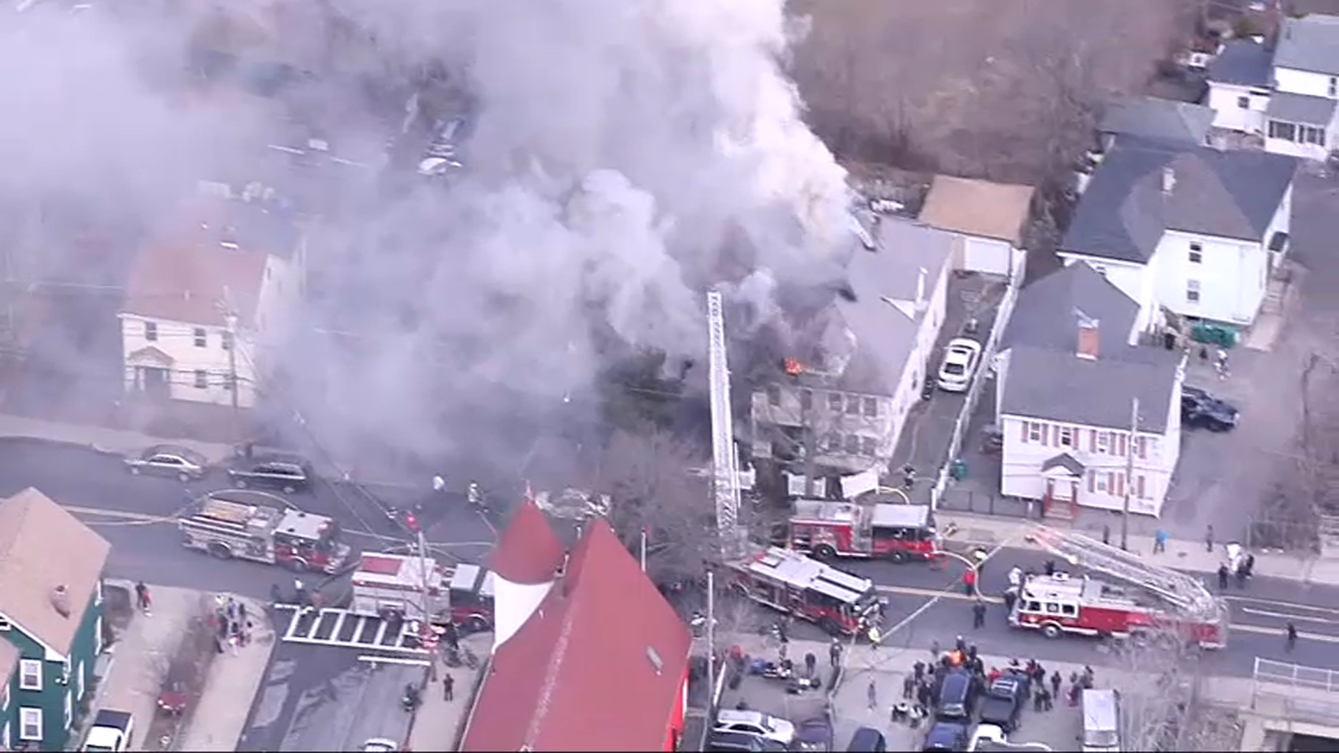 Smoke pouring from a building fire in Lynn, Massachusetts, on Friday, March 31, 2023.