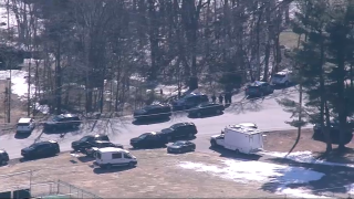 Police at the scene of a standoff in Ashburnham, Massachusetts, on Thursday, March 30, 2023.