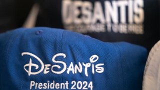 Apparel promoting Florida Governor Ron DeSantis sit on a table before a book tour event at the North Charleston Coliseum on April 19, 2023 in North Charleston, South Carolina.