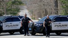 Police block Williams Street in Dighton, Massachusetts, as the FBI investigates the home of a 21-year-old member of the Massachusetts Air National Guard in connection with the disclosure of highly classified military documents on the Ukraine war on Thursday, April 13, 2023.