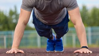 The fitness standards are adjusted for age and gender and require potential recruits to do a certain number of sit-ups in a minute and to run a mile and a half in a certain timeframe.