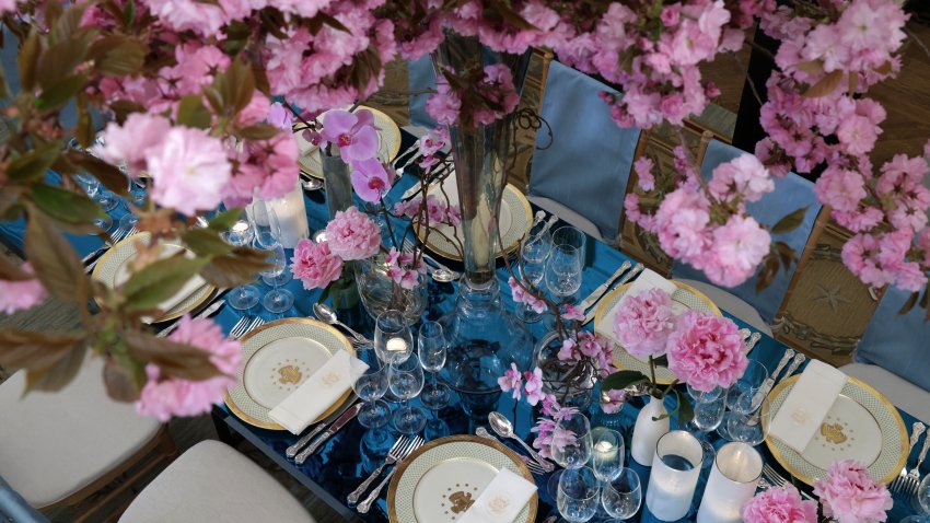 WASHINGTON, DC – APRIL 24: Place settings and flowers are displayed at a media preview of the state dinner during Wednesday’s visit by South Korean President Yoon Suk Yeol and his wife Kim Keon Hee in the State Dining Room of the White House on April 24, 2023 in Washington, DC. President Joe Biden will also hold a bilateral meeting and joint news conference with President Yoon during the state visit on Wednesday. (Photo by Alex Wong/Getty Images)