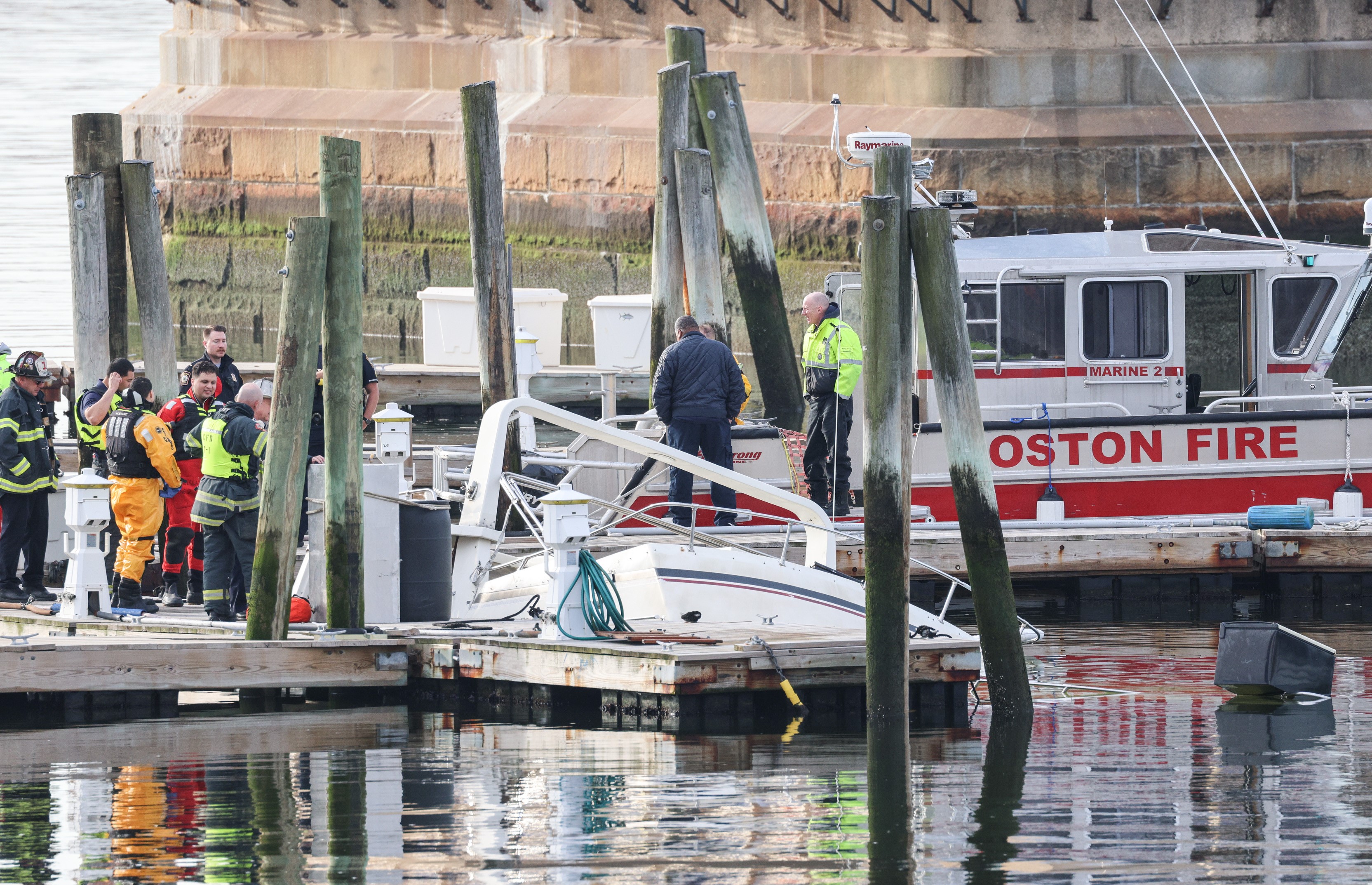 A sunken boat in Chelsea, Massachusetts, on Tuesday, April 4, 2023.