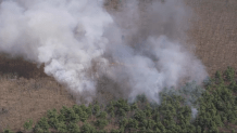 A brush fire burning in Northboro, Massachusetts, on Friday, April 14, 2023.